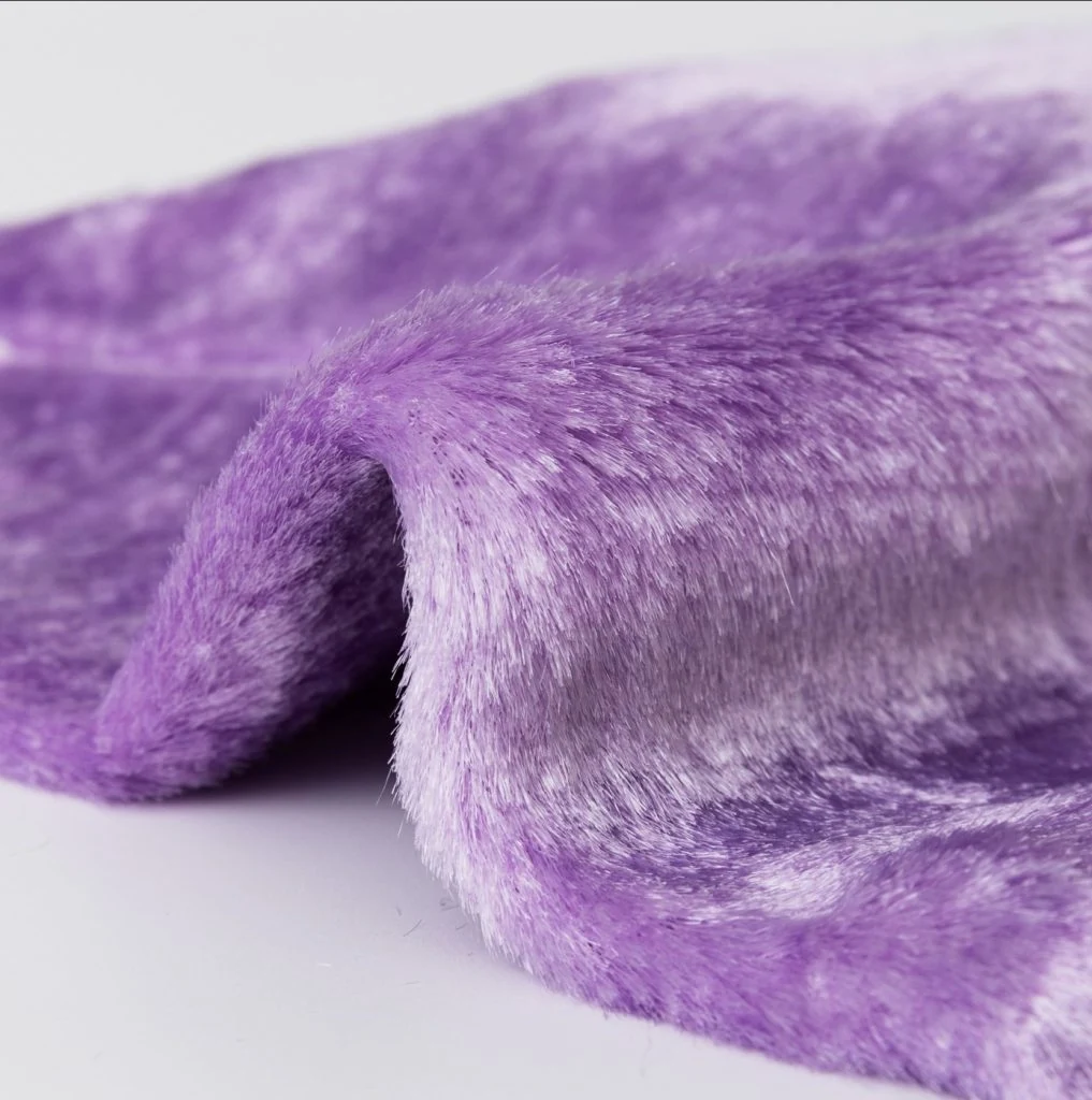 Close view of bamboo fiber cleaning cloth texture and stitched edge finish.